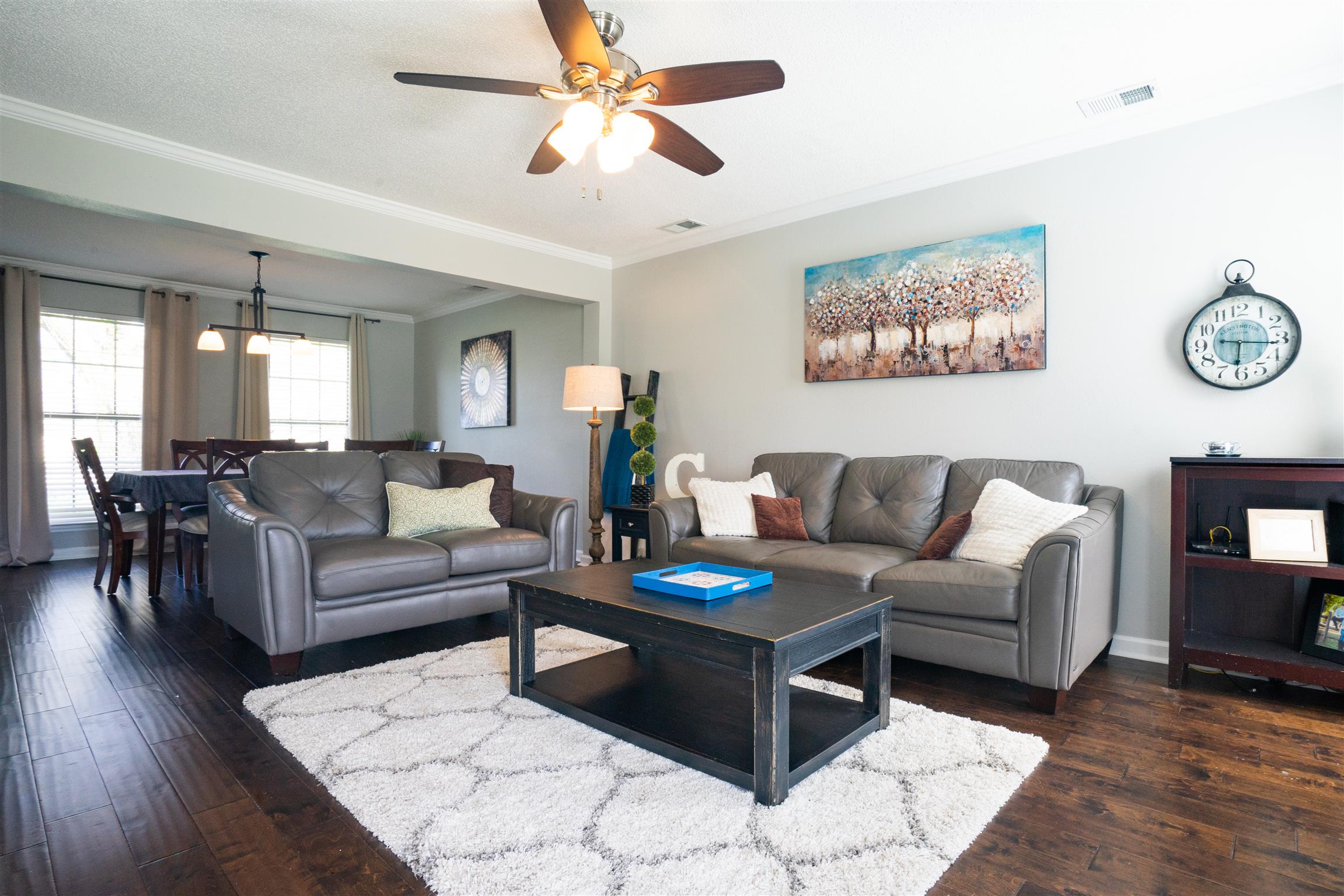 4002 Amber Way Spring Hill, TN 37174 - Photo 7 of 21 a living room with furniture and wooden floor