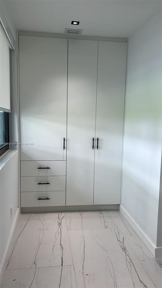 1155 102nd Street, Unit 7 Bay Harbor Islands, FL 33154 - Photo 4 of 10 a view of an empty room