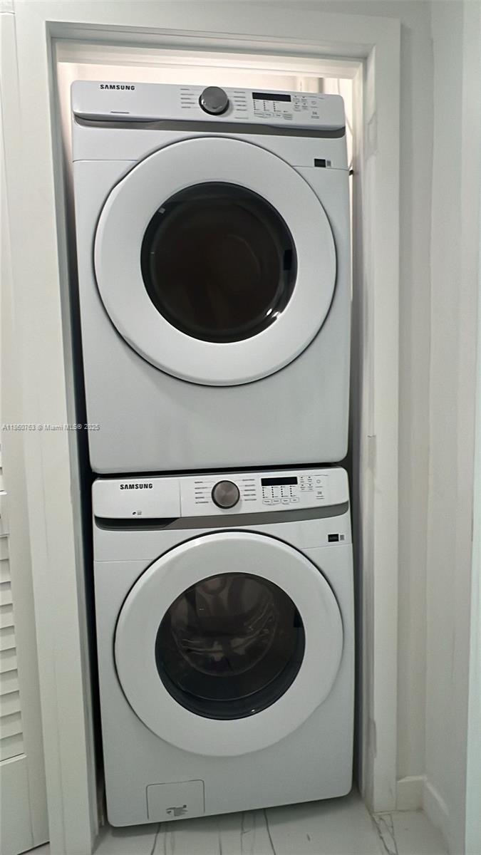 1155 102nd Street, Unit 7 Bay Harbor Islands, FL 33154 - Photo 10 of 10 a utility room with dryer and washer