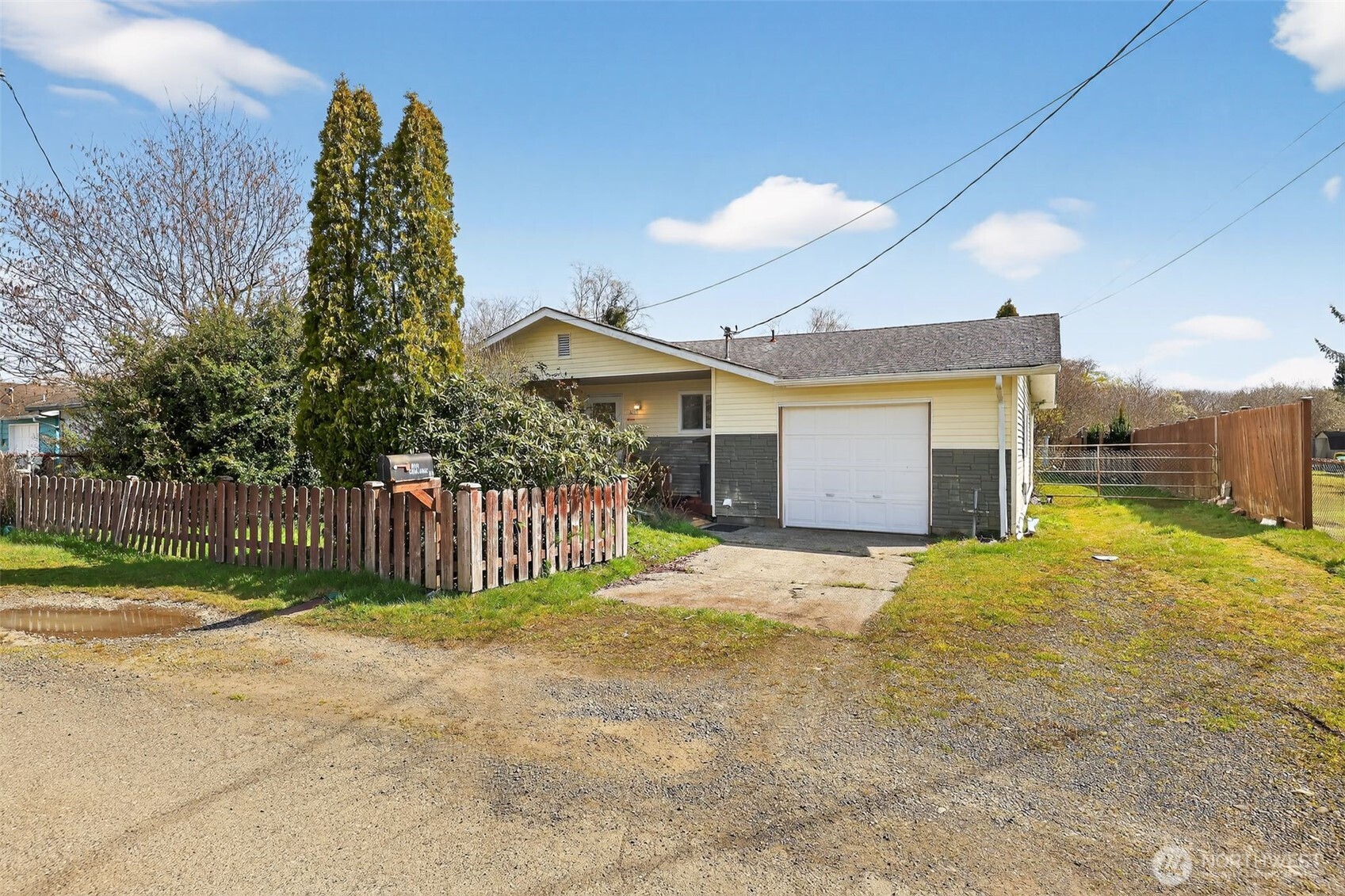 1010 Coolidge Road Aberdeen, WA 98520 - Photo 2 of 22 a view of a house with a yard and fence