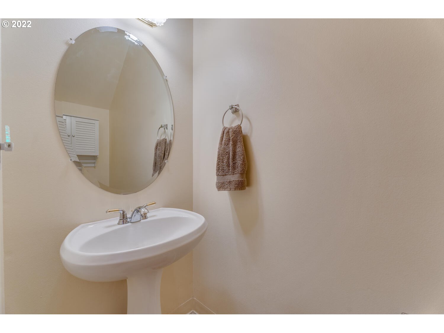 1012 57th Street Washougal, WA 98671 - Photo 11 of 31 a bathroom with a sink and a mirror