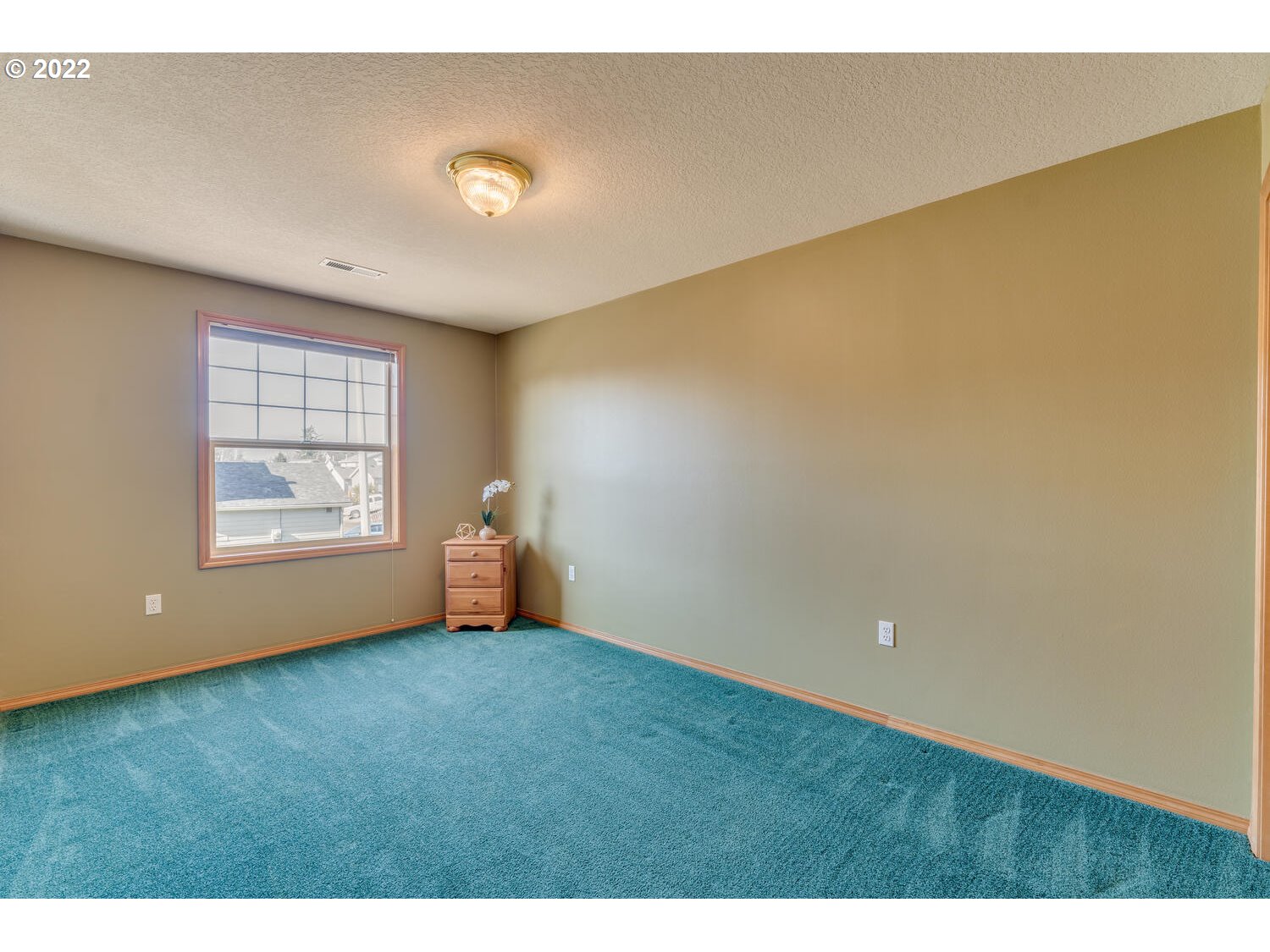 1012 57th Street Washougal, WA 98671 - Photo 14 of 31 a view of an empty room with a window