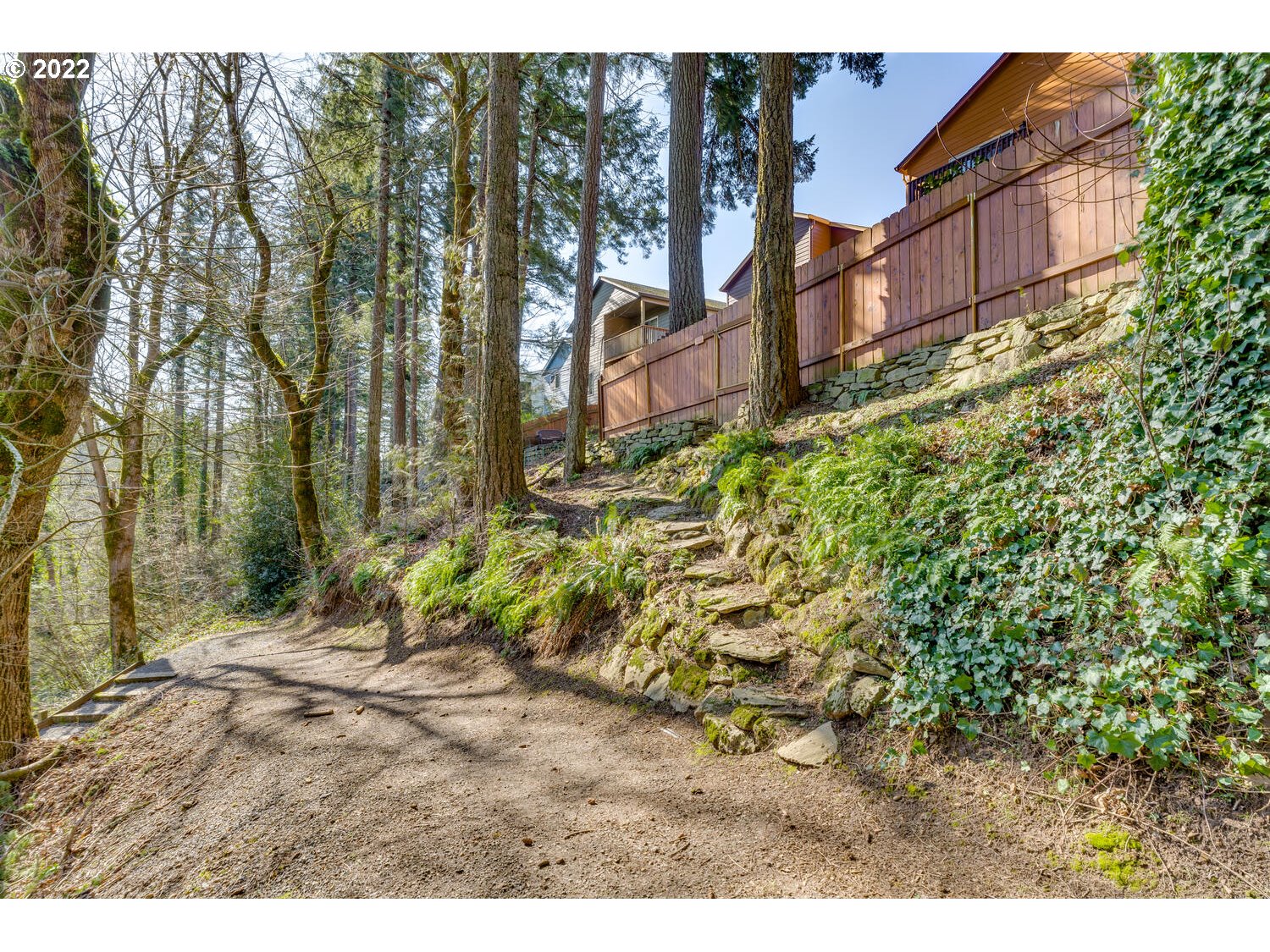 1012 57th Street Washougal, WA 98671 - Photo 30 of 31 a backyard of a building with trees