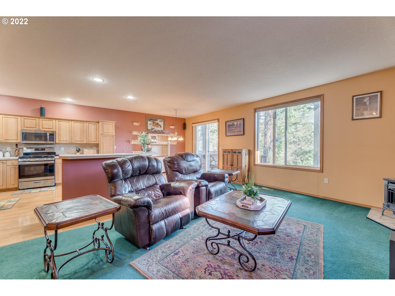 1012 57th Street Washougal, WA 98671 - Photo 4 of 31 a living room with furniture and a table