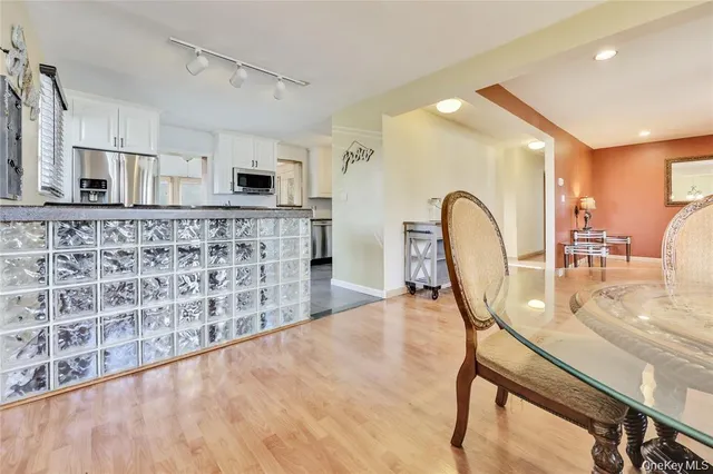 a dining room with furniture and a fireplace