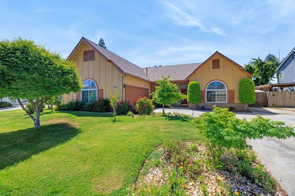 a house view with a garden space