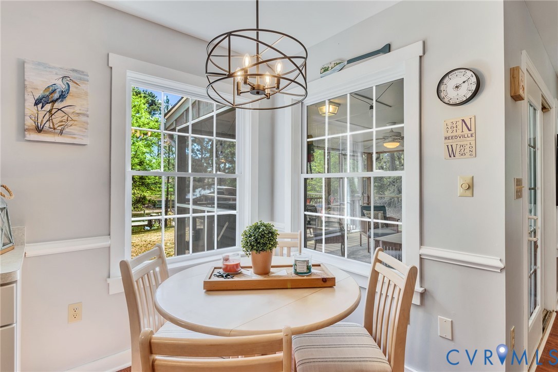 193 Deep Water Lane Reedville, VA 22539 - Photo 6 of 84 a view of a dining room with furniture window and outside view