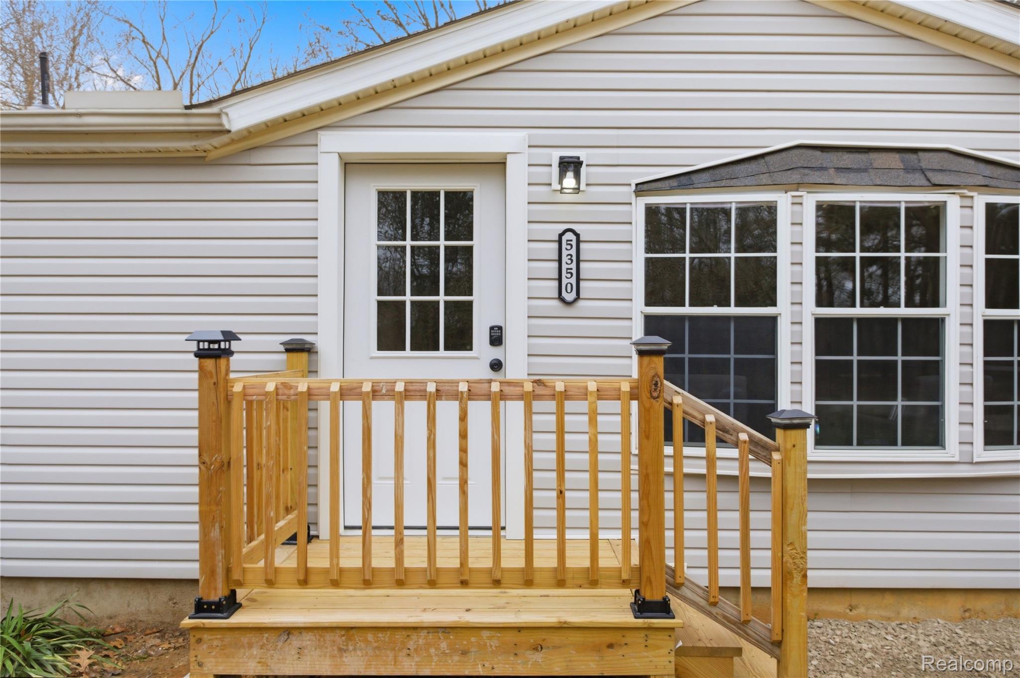 5350 List Road Grass Lake, MI 49240 - Photo 46 of 71 Doorway to property with a deck