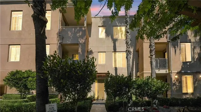 a front view of house and yard with green space