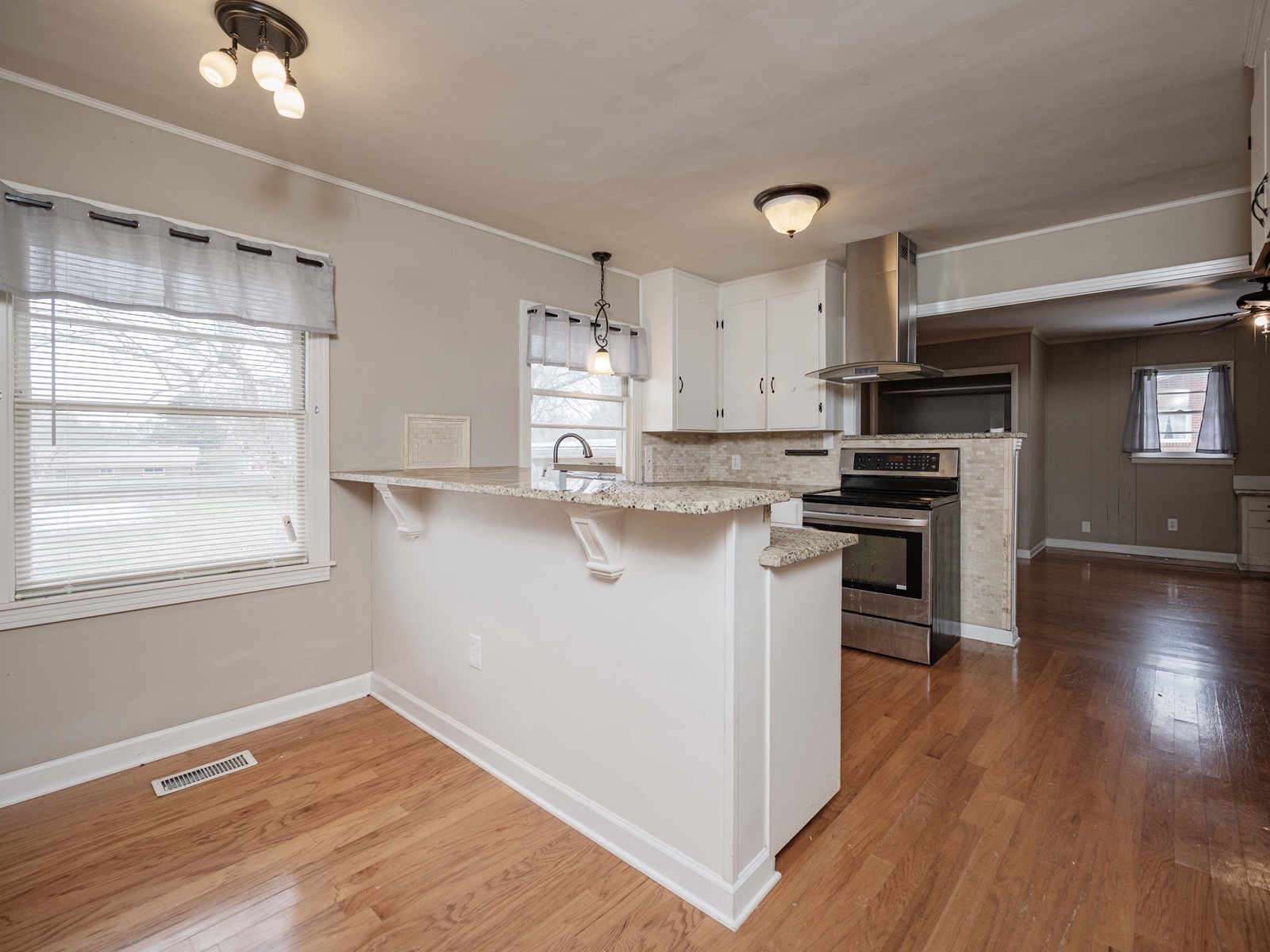 1611 White Boulevard Murfreesboro, TN 37129 - Photo 13 of 30 a kitchen with stainless steel appliances a stove top oven and a refrigerator