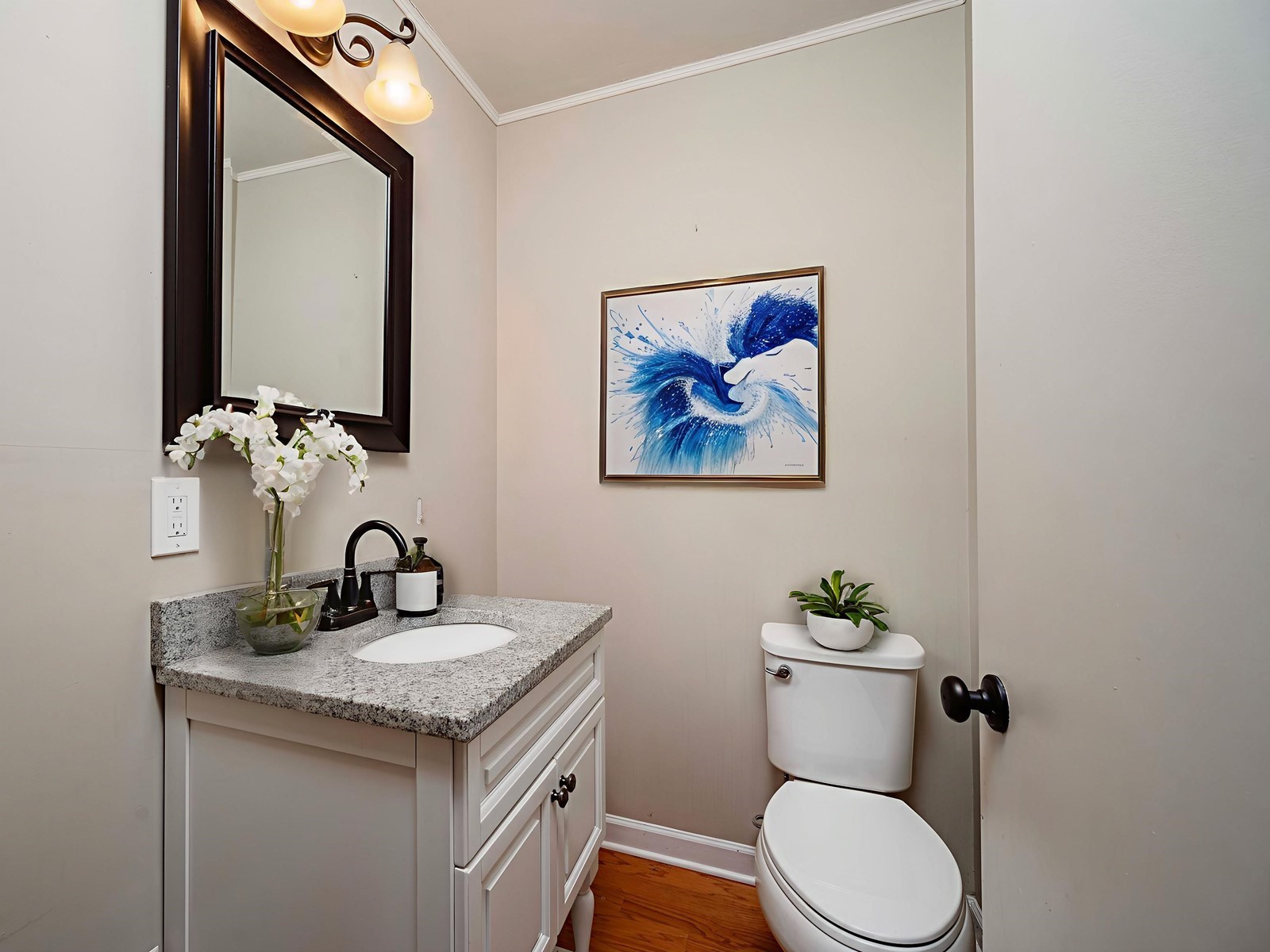 1611 White Boulevard Murfreesboro, TN 37129 - Photo 19 of 30 a bathroom with a toilet a sink and mirror