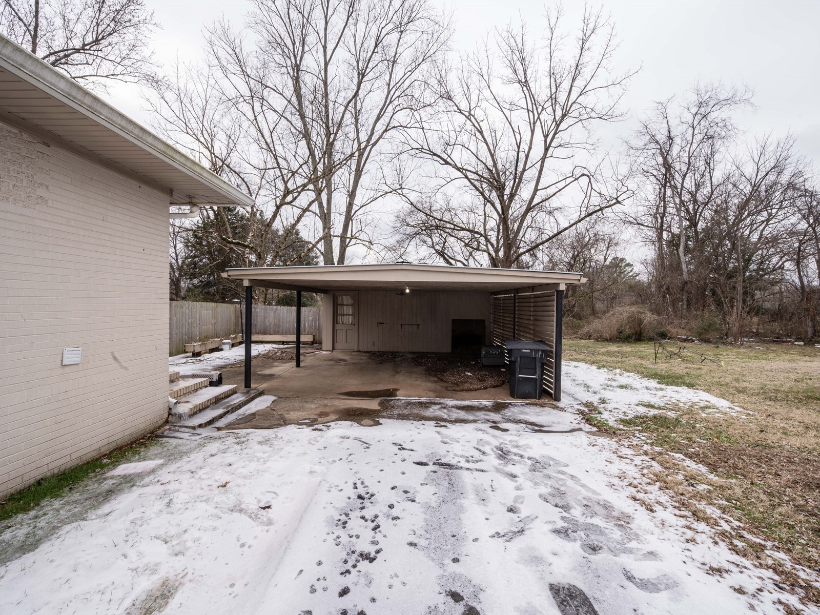 1611 White Boulevard Murfreesboro, TN 37129 - Photo 26 of 30 a view of a house with a yard covered in snow