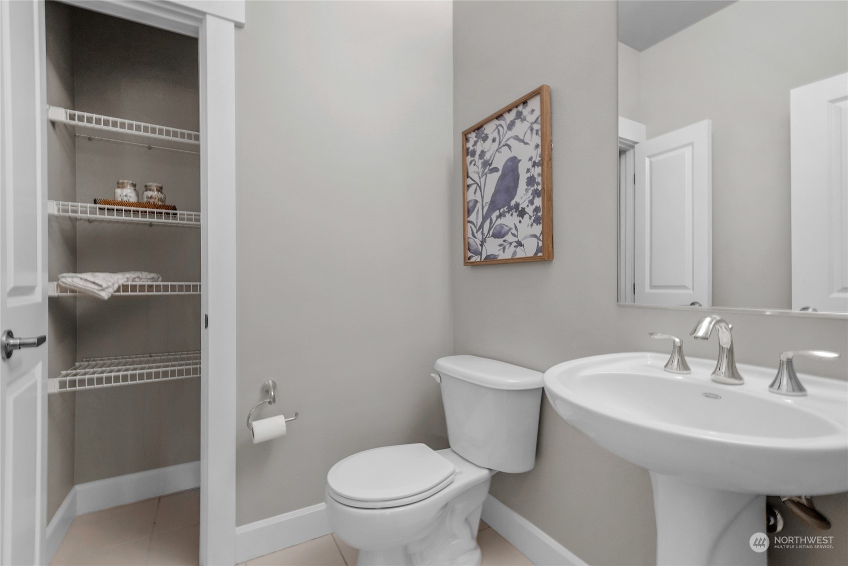 2115 201st Place Southeast, Unit D2 Bothell, WA 98012 - Photo 17 of 31 a bathroom with a toilet sink and mirror