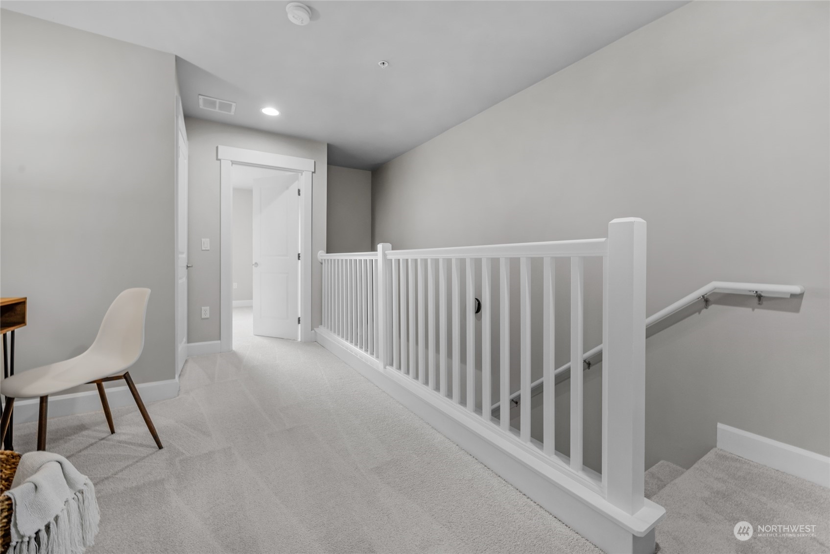 2115 201st Place Southeast, Unit D2 Bothell, WA 98012 - Photo 19 of 31 a view of a hallway with chairs