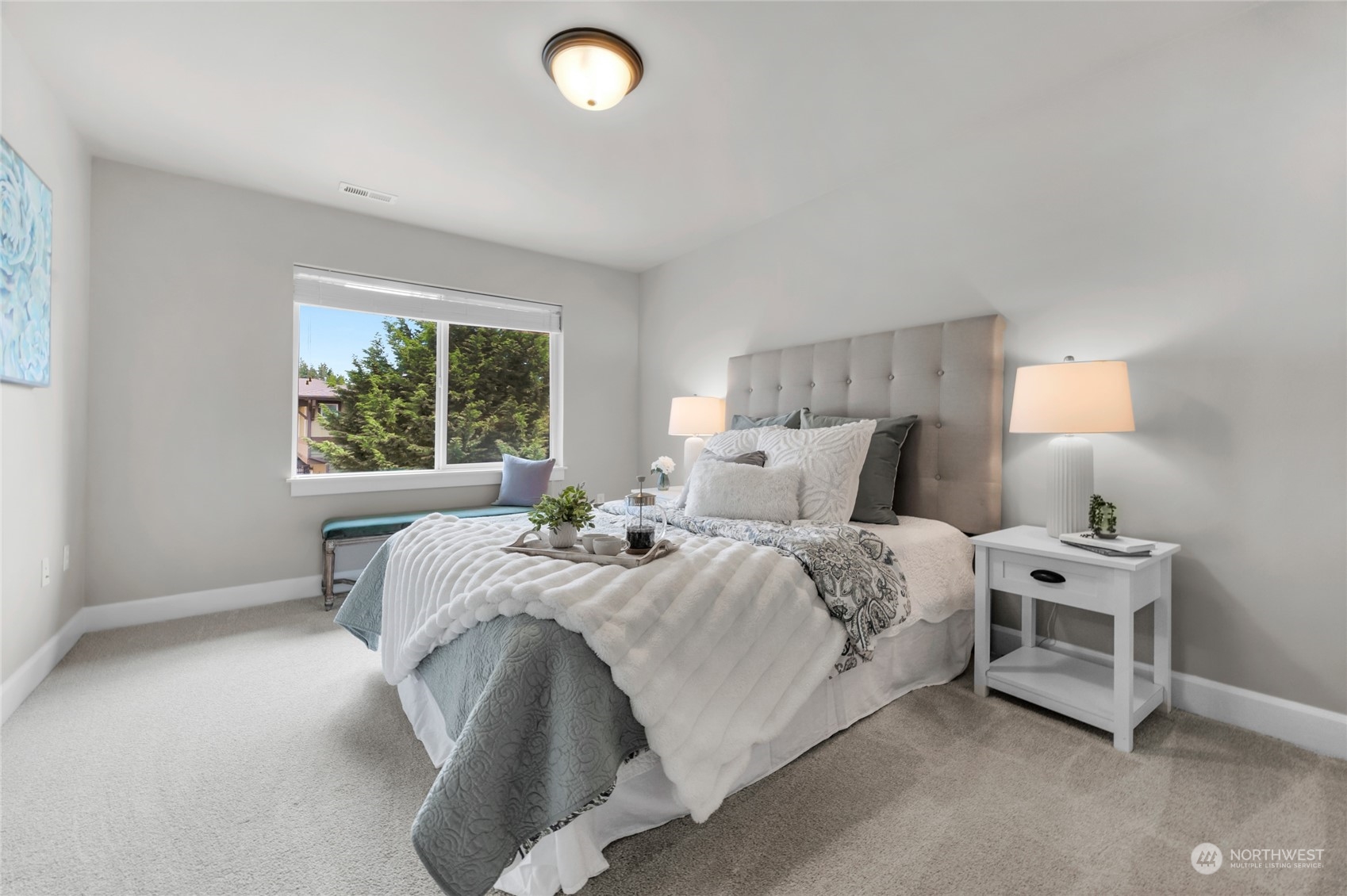 2115 201st Place Southeast, Unit D2 Bothell, WA 98012 - Photo 22 of 31 a bedroom with bed and a window