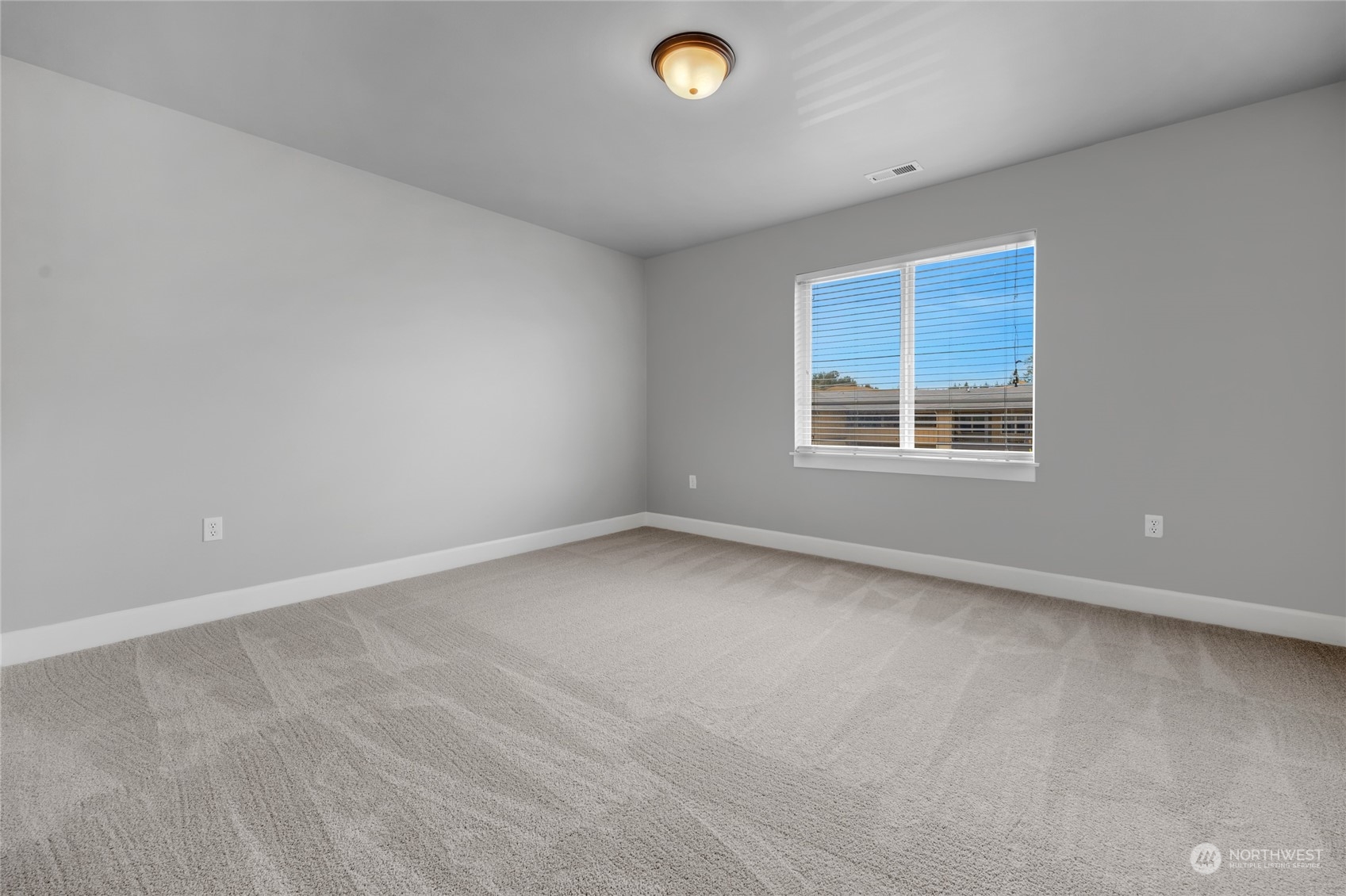 2115 201st Place Southeast, Unit D2 Bothell, WA 98012 - Photo 26 of 31 an empty room with a window
