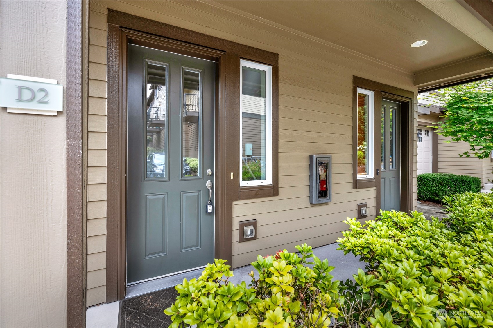 2115 201st Place Southeast, Unit D2 Bothell, WA 98012 - Photo 4 of 31 a view of a entryway door of the house