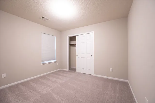 an empty room with a natural light