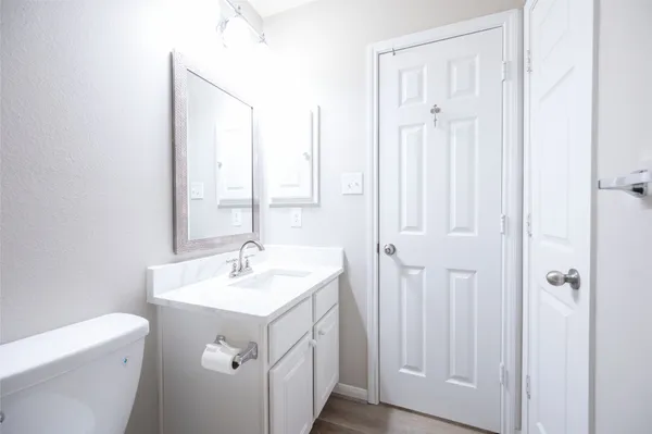 a bathroom with a sink and a toilet