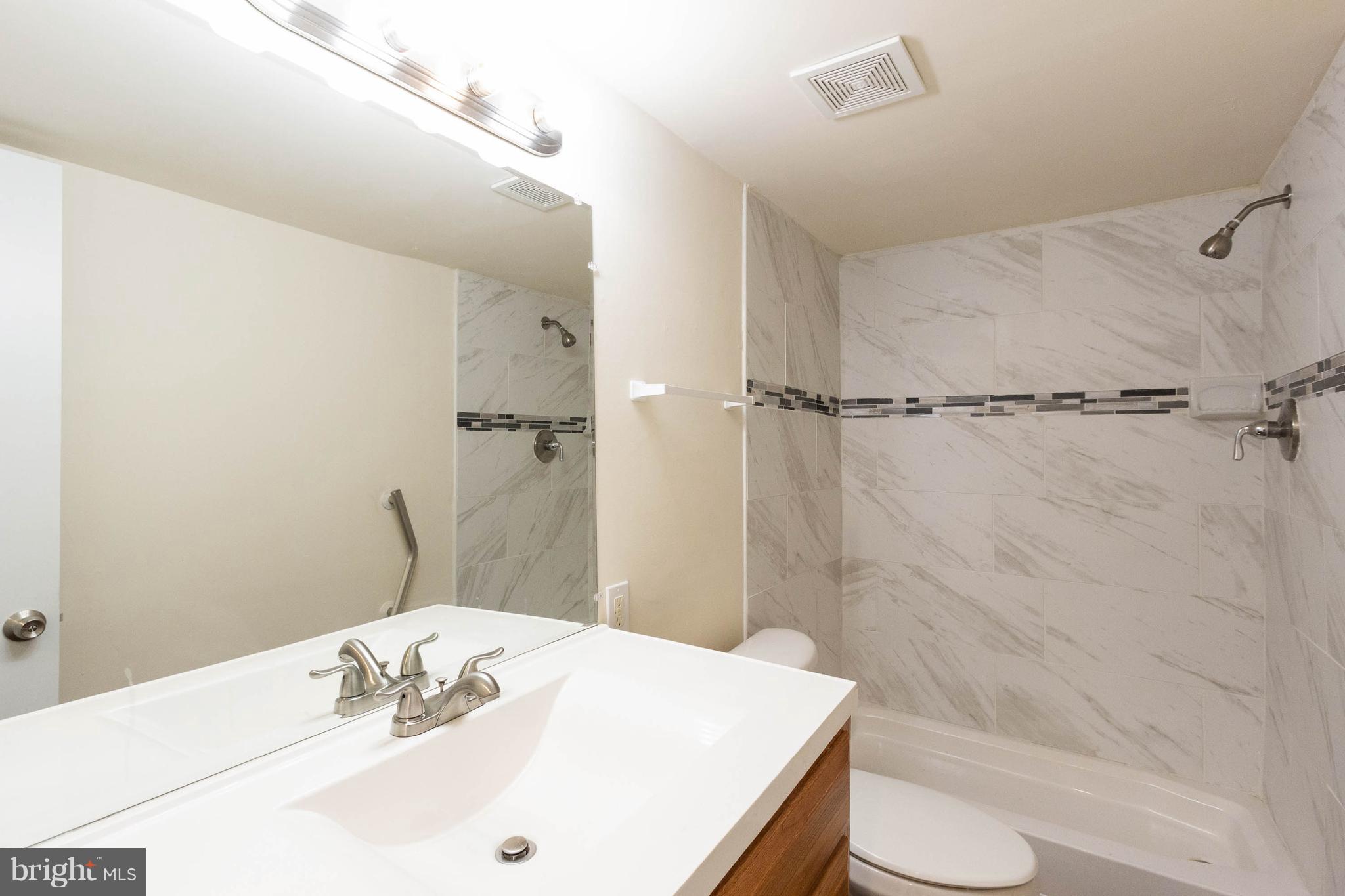 3141 Partlow Road Partlow, VA 22534 - Photo 3 of 25 a bathroom with a sink toilet and shower