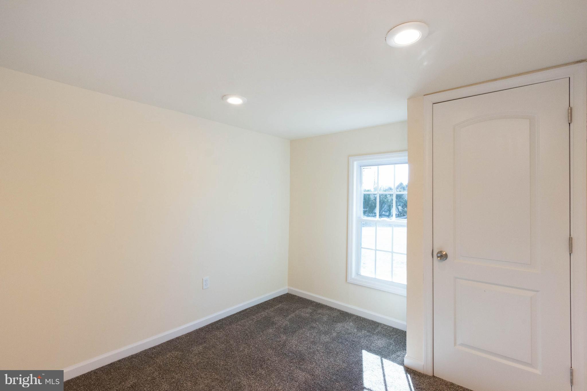 3141 Partlow Road Partlow, VA 22534 - Photo 4 of 25 an empty room with windows