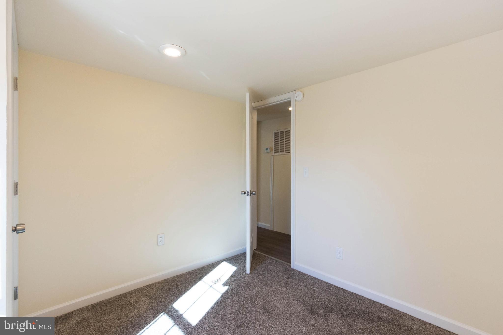 3141 Partlow Road Partlow, VA 22534 - Photo 5 of 25 an empty room with windows