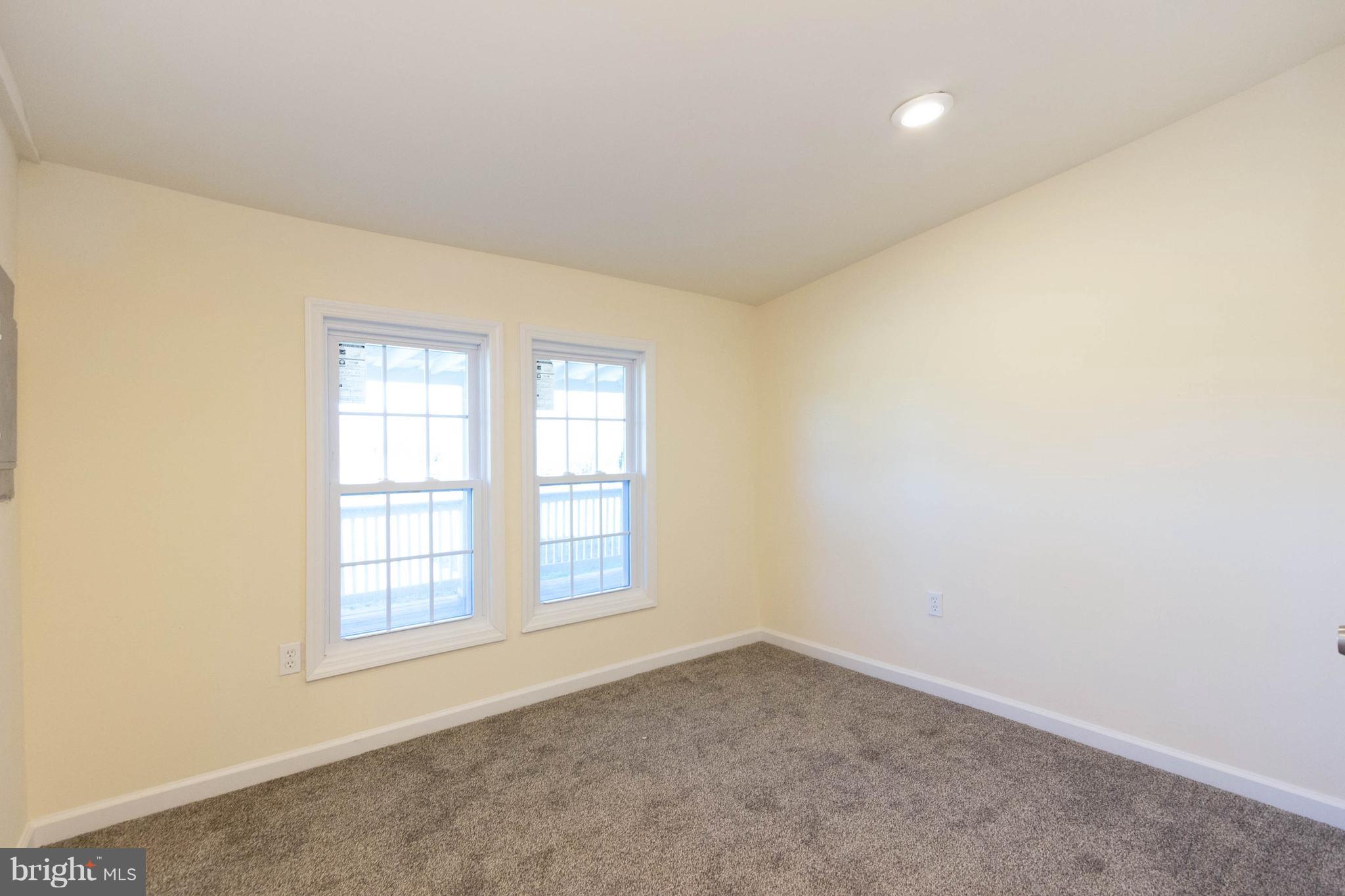 3141 Partlow Road Partlow, VA 22534 - Photo 6 of 25 an empty room with windows