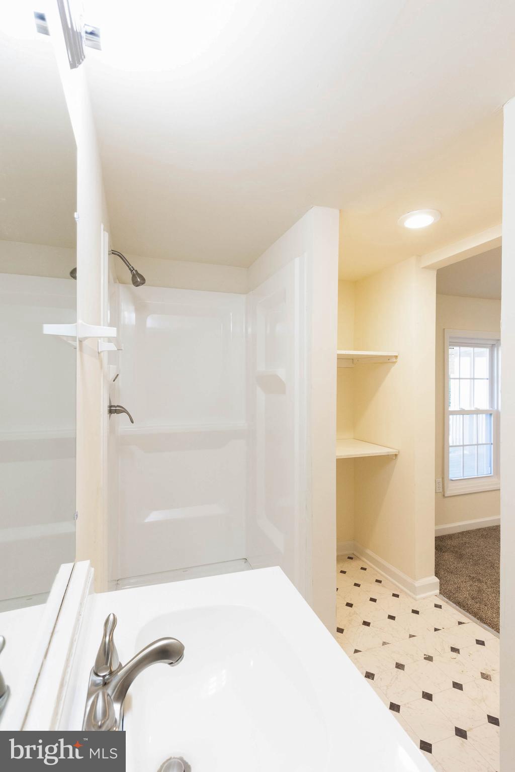 3141 Partlow Road Partlow, VA 22534 - Photo 8 of 25 a bathroom with a bathtub and shower