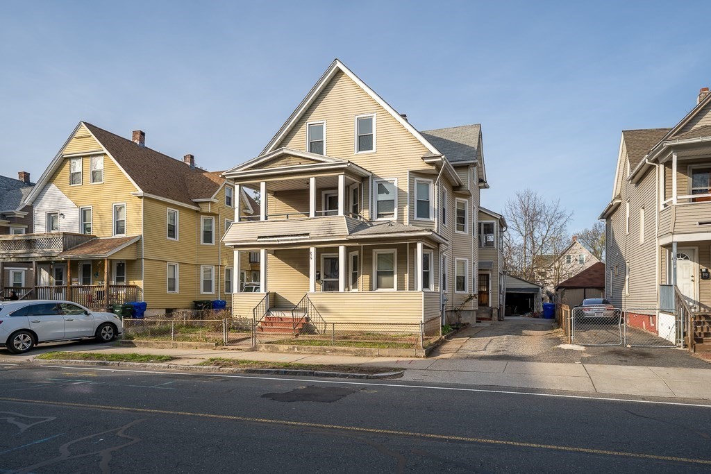 215 White Street Springfield, MA 01108 - Photo 2 of 33 a front view of a building with street