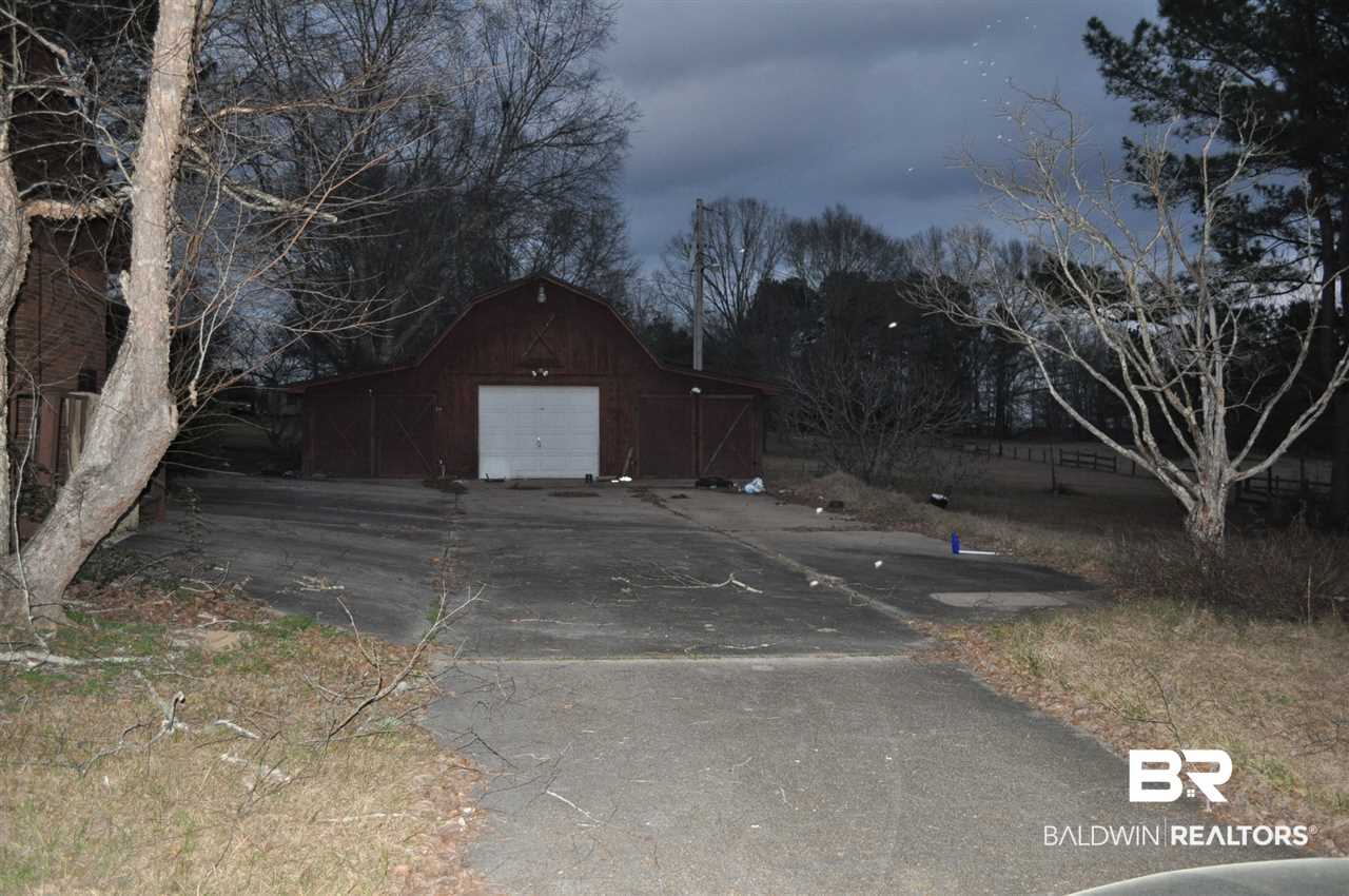 100 Wagon Wheel Road Flomaton, AL 36441 - Photo 16 of 19 Storage, workshop, garage