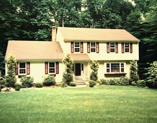 278 Whiting Pond Road Fairfield, CT 06824 - Photo 1 of 1 front view of house with a yard