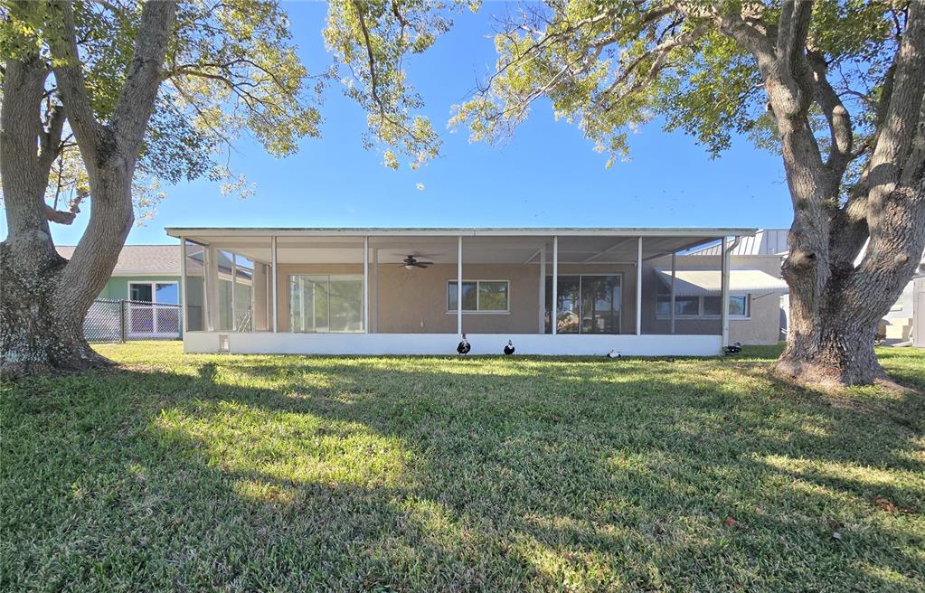 3604 Delta Place Holiday, FL 34691 - Photo 38 of 41 a view of a house with backyard and garden