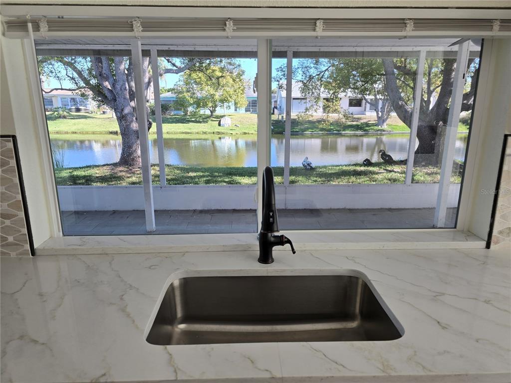 3604 Delta Place Holiday, FL 34691 - Photo 6 of 41 a bathroom with a bathtub