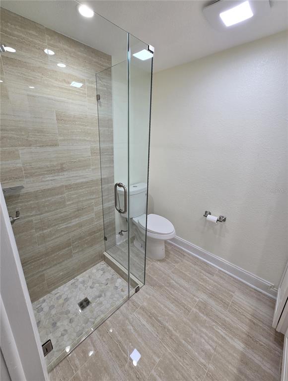 3604 Delta Place Holiday, FL 34691 - Photo 7 of 41 a bathroom with a shower