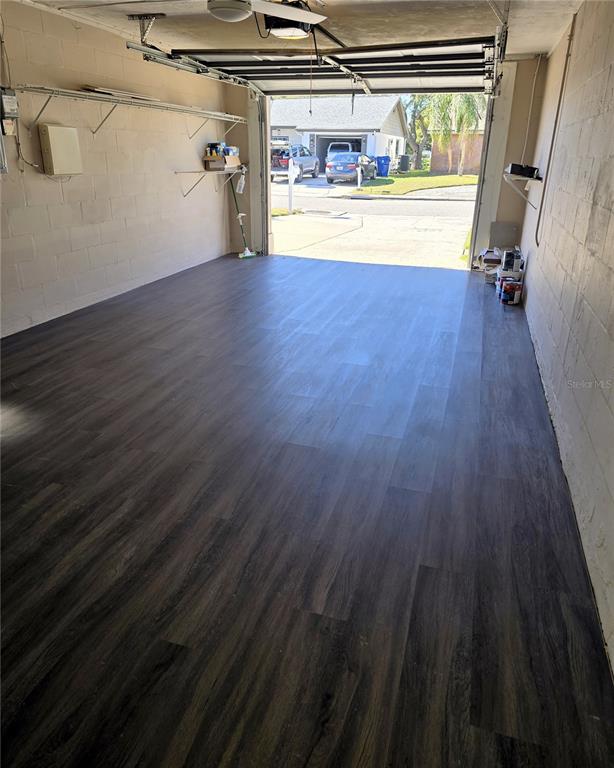 3604 Delta Place Holiday, FL 34691 - Photo 8 of 41 a view of a room with wooden floor and a window