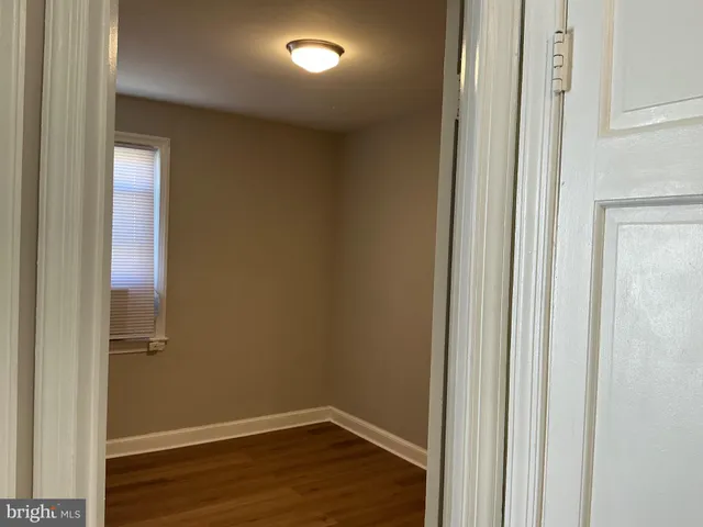 a view of small space with wooden floor