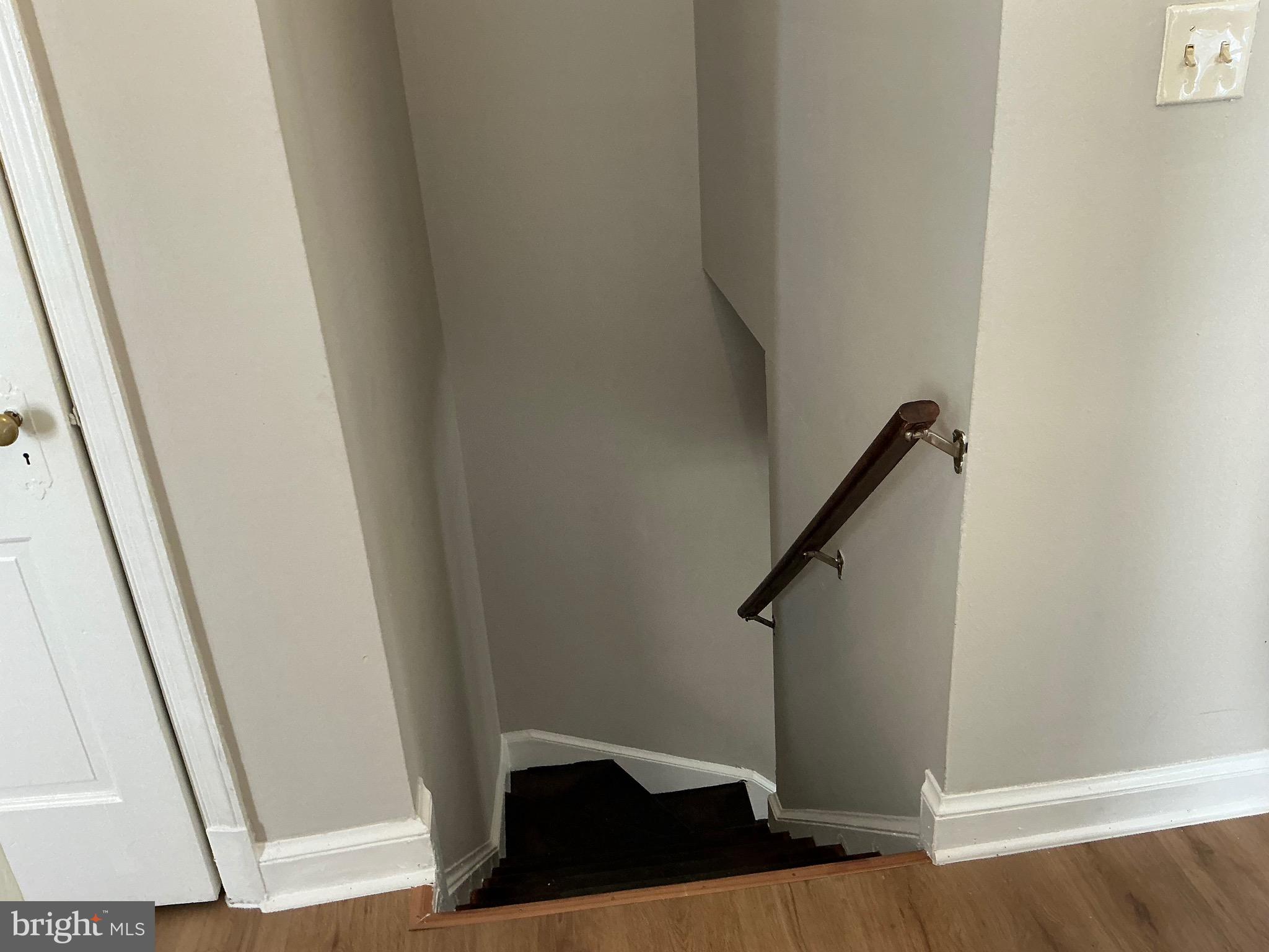 1671 Fort Davis Place Southeast Washington, DC 20020 - Photo 19 of 22 a view of entryway with stairs and wooden floor