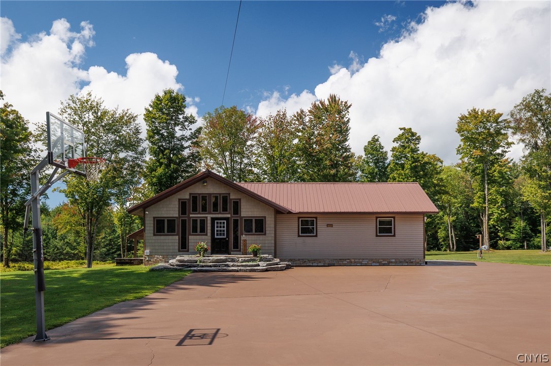 5117 Pleasant Valley Road North Greig, NY 13312 - Photo 2 of 49 2 year old metal roof on house and hot tub area