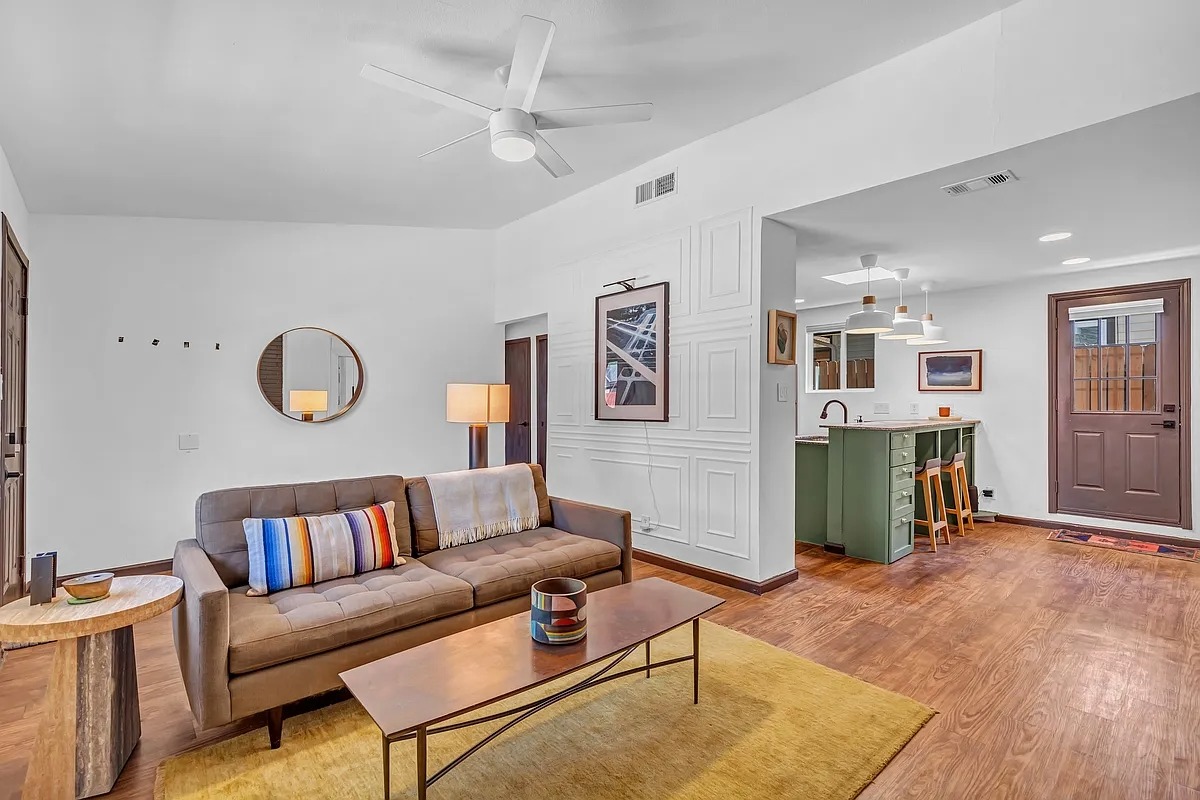 2307 Teri Road Austin, TX 78744 - Photo 15 of 28 Living area with a ceiling fan, light wood-style floors, and recessed lighting