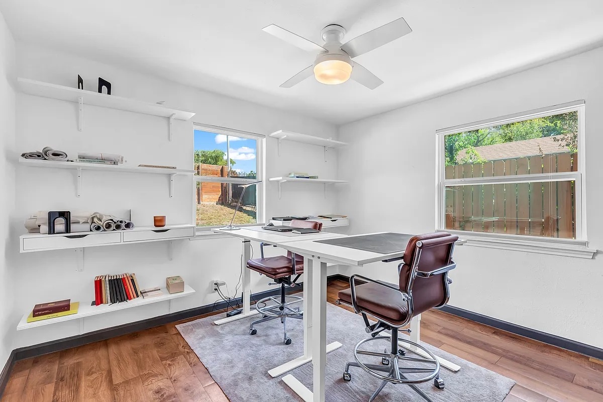 2307 Teri Road Austin, TX 78744 - Photo 20 of 28 Office featuring light wood-style flooring, healthy amount of natural light, and a ceiling fan