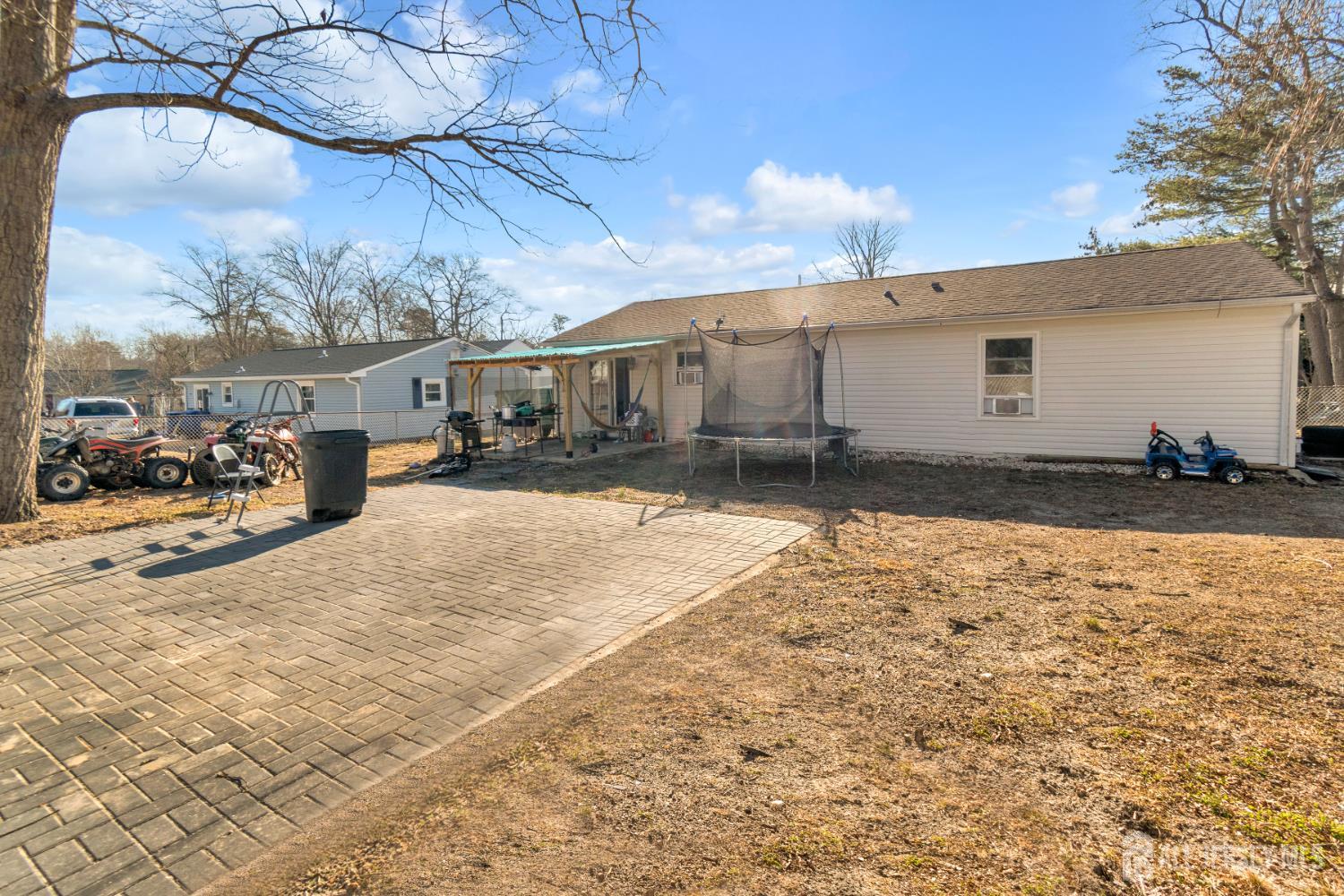 135 Hanover Street Pemberton, NJ 08068 - Photo 14 of 17 a view of a yard with cars