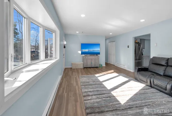 a large white room with a large window