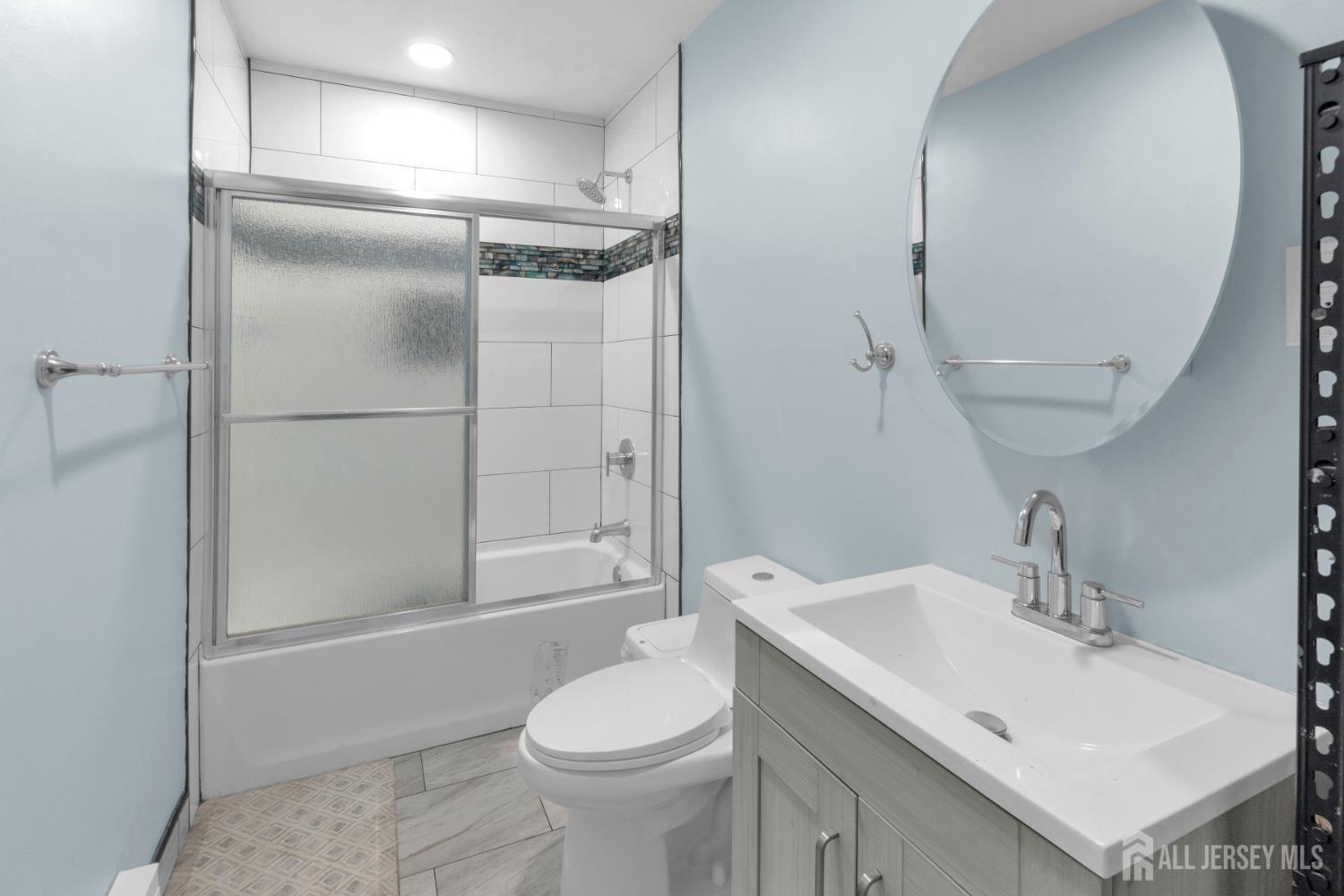 135 Hanover Street Pemberton, NJ 08068 - Photo 9 of 17 a bathroom with a sink toilet and shower