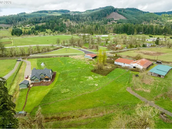 a view of a play ground with a yard