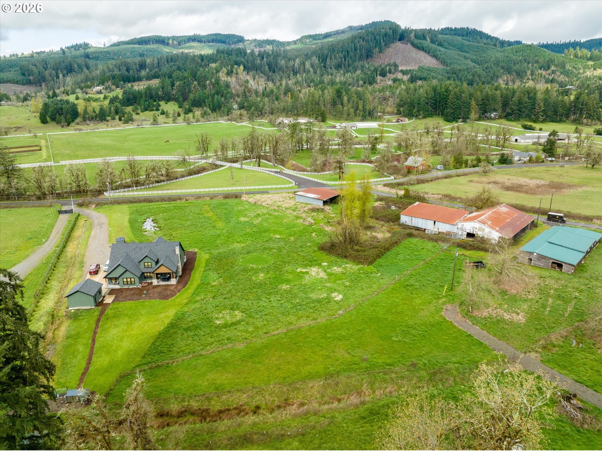 Worth Springfield, OR 97478 - Photo 15 of 24 a view of a lake with a yard and a swimming pool