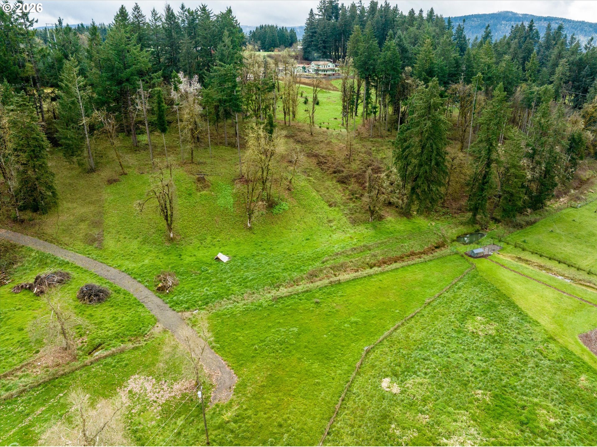 Worth Springfield, OR 97478 - Photo 19 of 24 a view of a lake with a yard