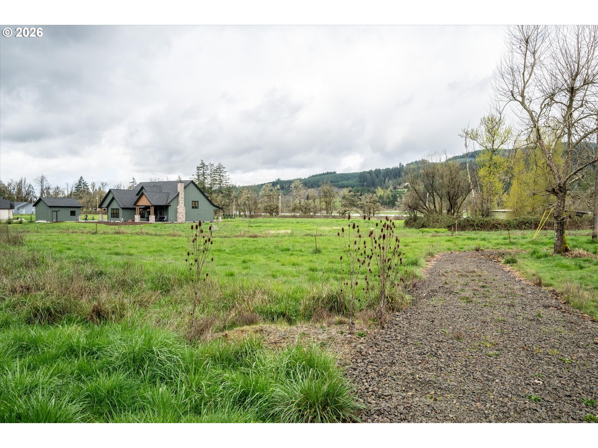 Worth Springfield, OR 97478 - Photo 22 of 24 a view of a big yard with lots of green space