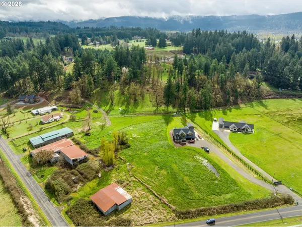 an aerial view of a golf course with chairs