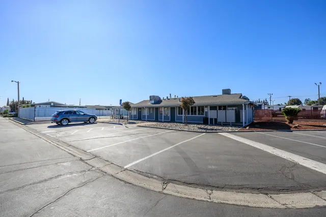 a view of a city street with cars