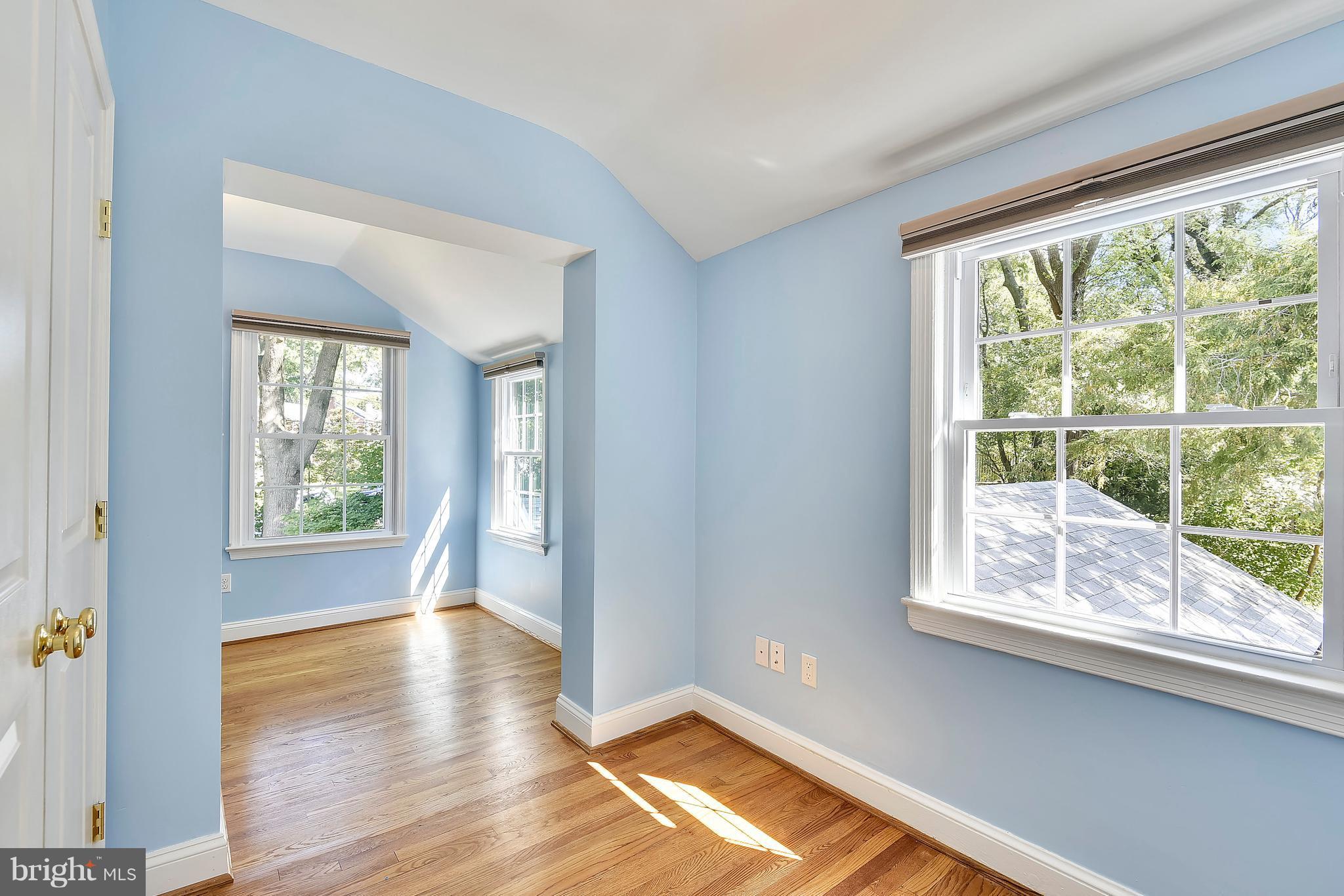 10001 Raynor Road Silver Spring, MD 20901 - Photo 14 of 30 a view of empty room with wooden floor and fan